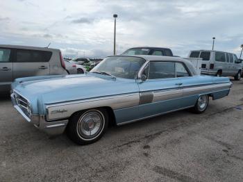  Salvage Oldsmobile Starfire